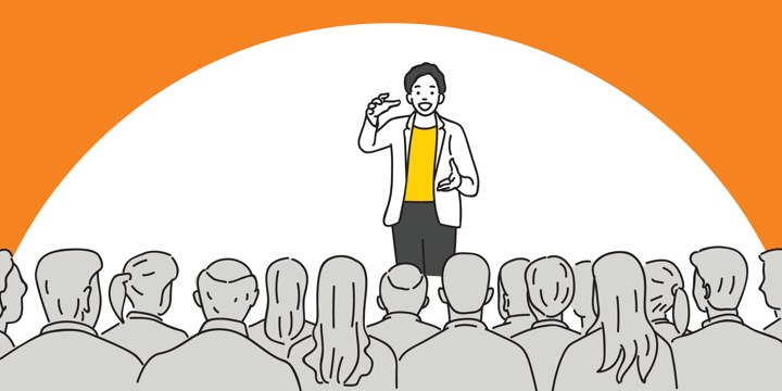 drawing of a speaker standing in front of an audience and gesturing with both hands