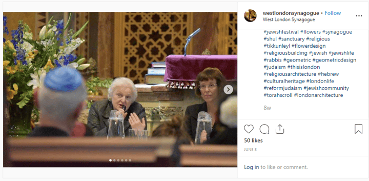 Instagram post showing a panel discussion at a synagogue