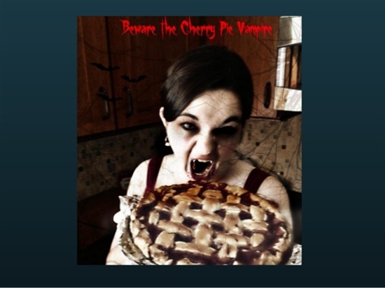 Picture of Meggan in which she has made herself look like a vampire eating cherry pie