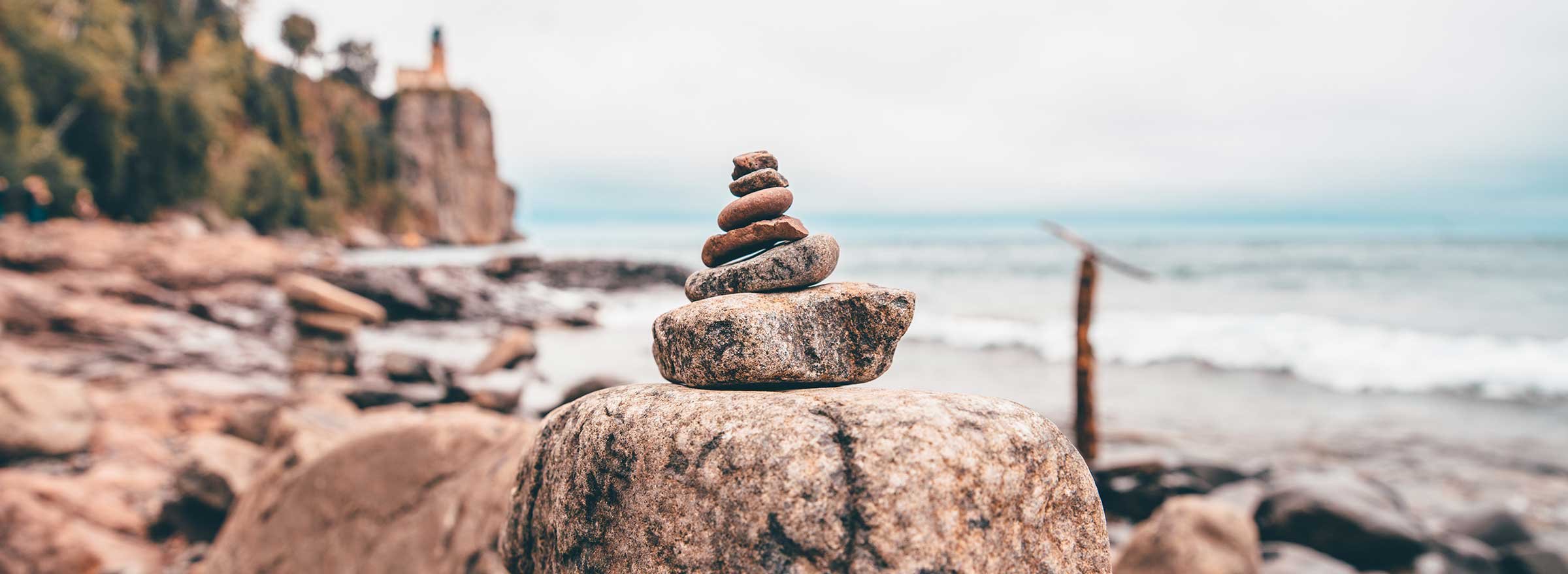 a cairn of piled rocks, symbolizing the way toward nonprofit stability and sustainability