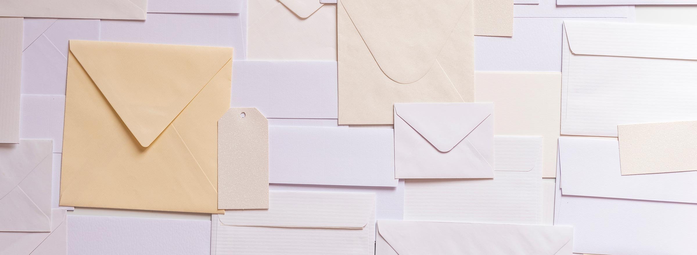 many envelopes of different sizes, representing email marketing for nonprofits