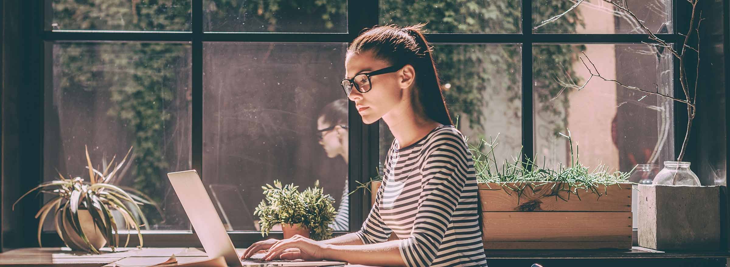 woman working on a laptop