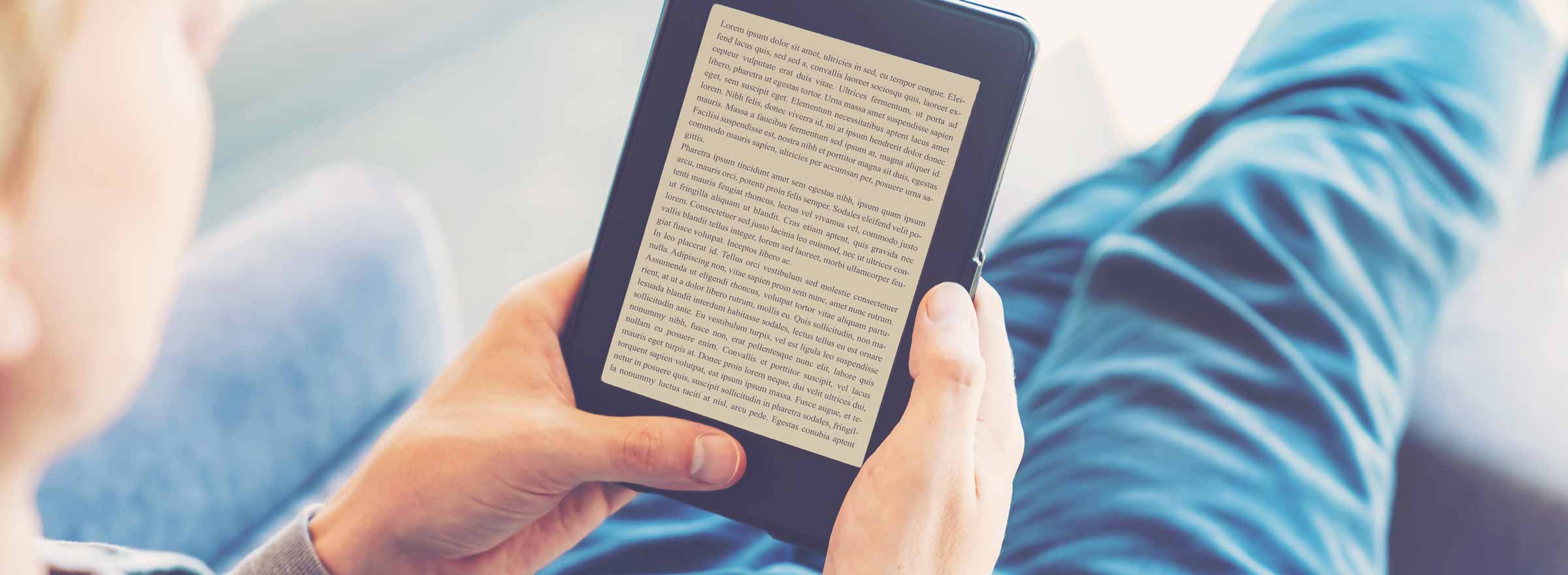 person reading text on an e-reader