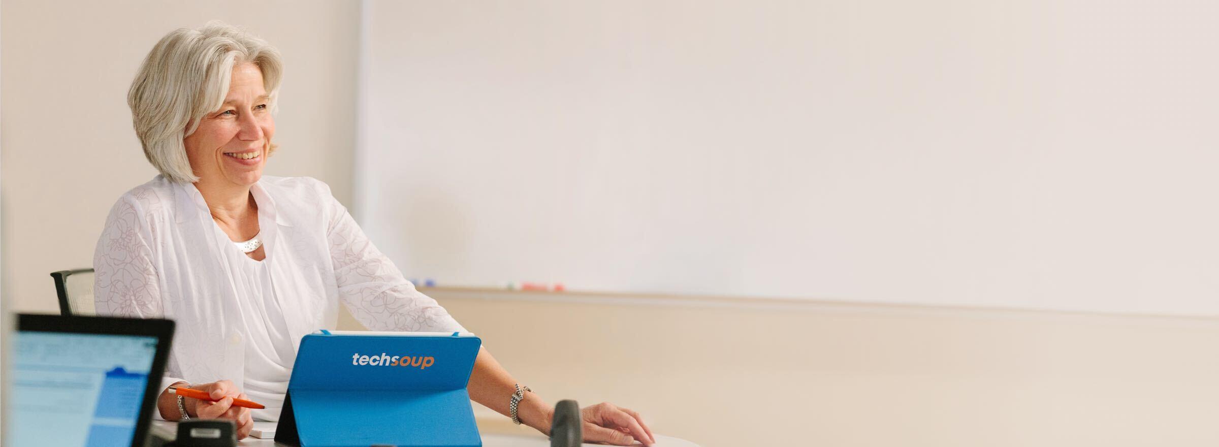 Rebecca Masisak conducts a meeting in her role as TechSoup CEO