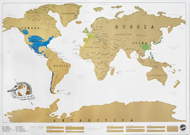 world map showing two areas partially scratched off